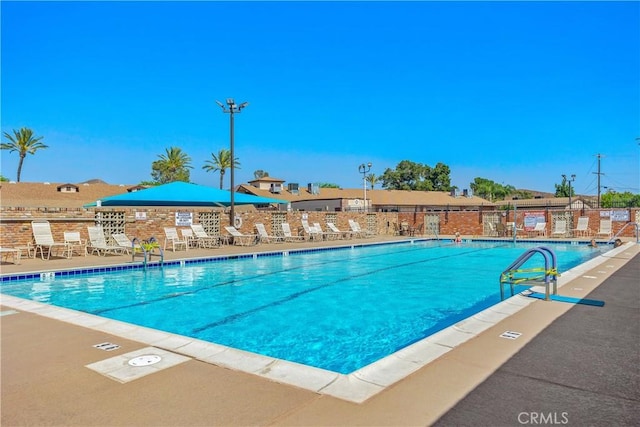 view of pool featuring a patio area