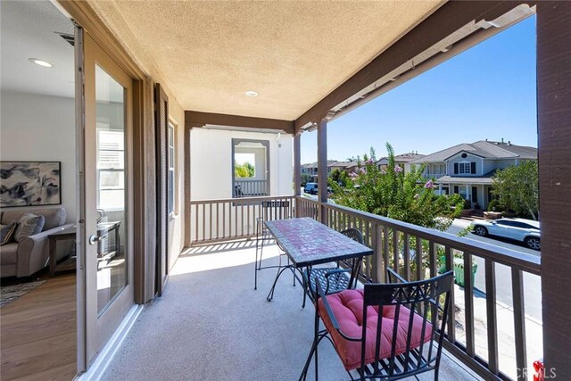 balcony featuring a residential view