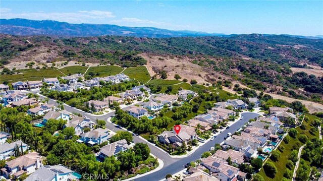 bird's eye view with a residential view and a mountain view