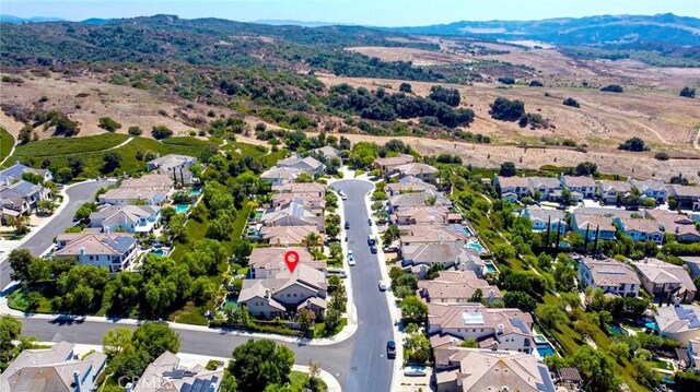 bird's eye view with a residential view and a mountain view