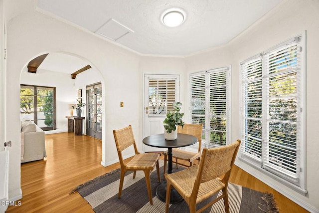 dining area featuring wood-type flooring