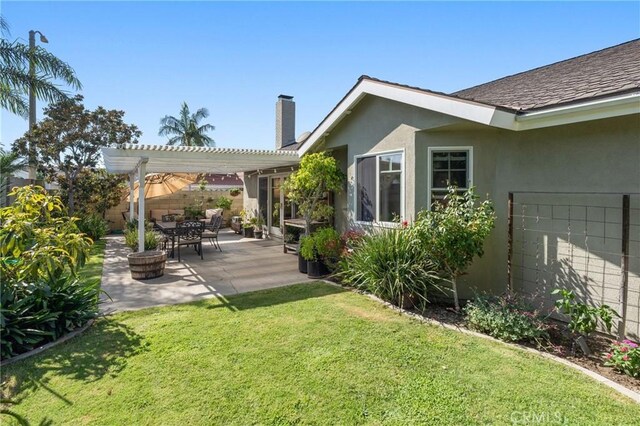 view of yard featuring a pergola and a patio area