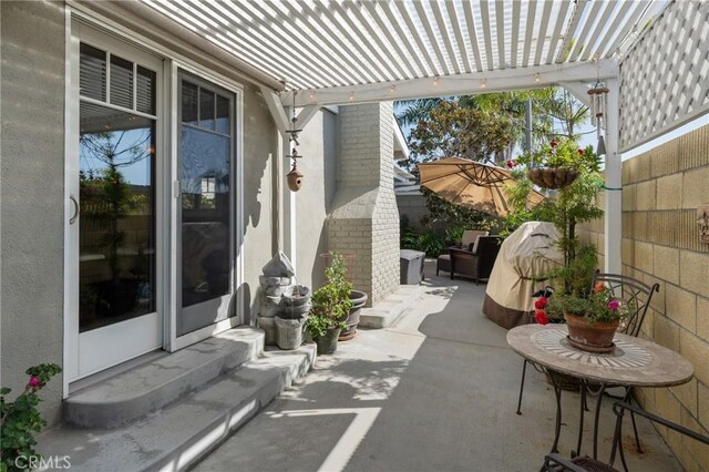 view of patio / terrace with a pergola