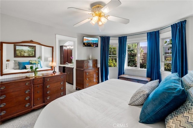 carpeted bedroom featuring ceiling fan