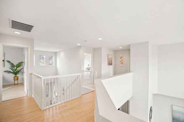 hall featuring wood-type flooring