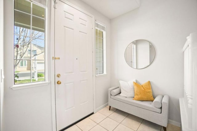 entryway featuring light tile patterned floors