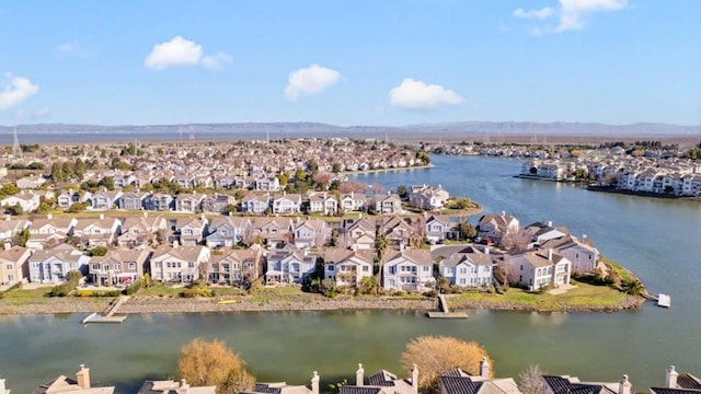 bird's eye view featuring a water and mountain view