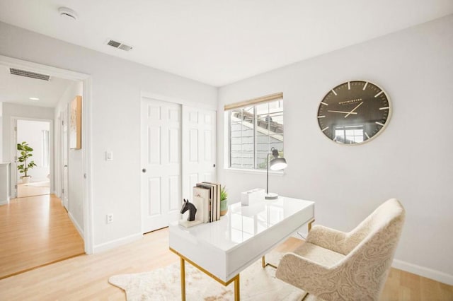 office space featuring light hardwood / wood-style floors