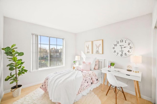 bedroom featuring light hardwood / wood-style flooring