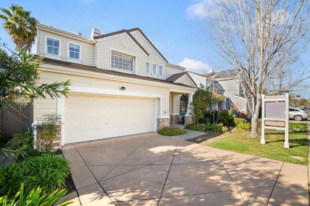 front of property with a garage