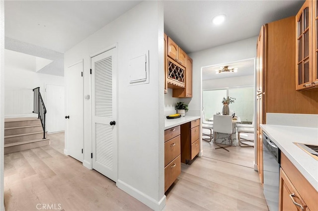 kitchen with light hardwood / wood-style floors and dishwasher