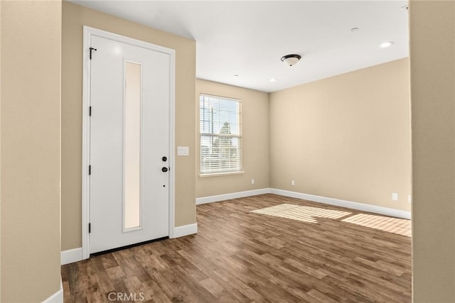 foyer entrance with hardwood / wood-style flooring