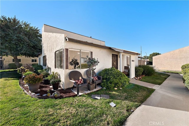 view of front of house with a front yard