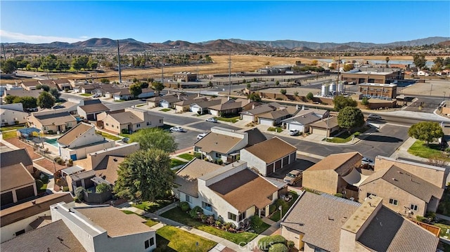 birds eye view of property featuring a mountain view