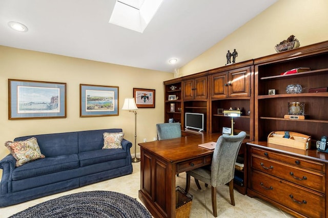 office featuring vaulted ceiling with skylight