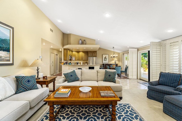 living room featuring lofted ceiling, a chandelier, and light tile patterned floors