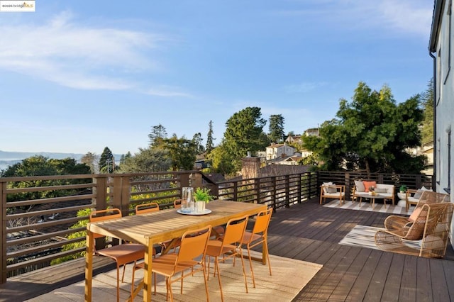 wooden deck featuring an outdoor hangout area