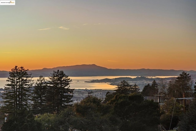 property view of mountains featuring a water view