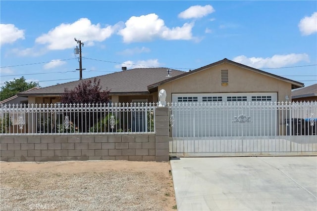 ranch-style house featuring a garage