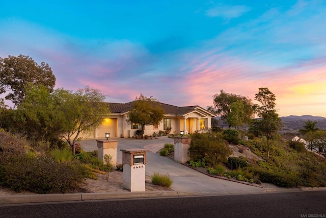 view of front of property with a garage