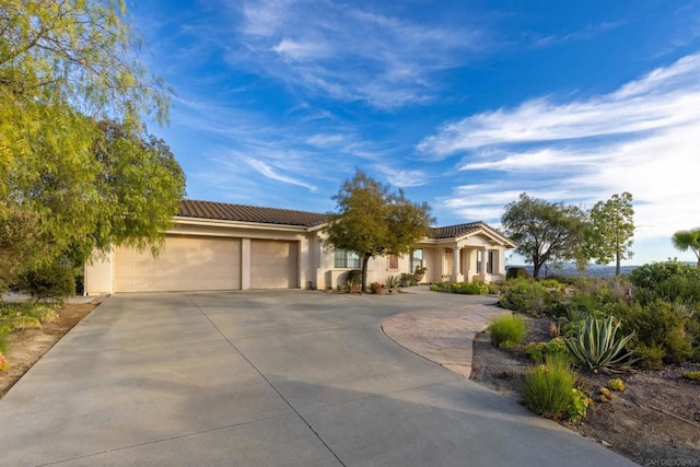 view of front of home with a garage