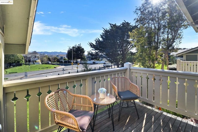 balcony featuring a mountain view