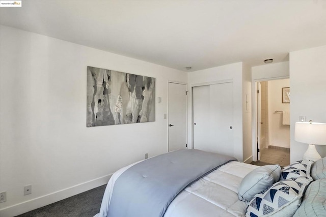 carpeted bedroom with a closet