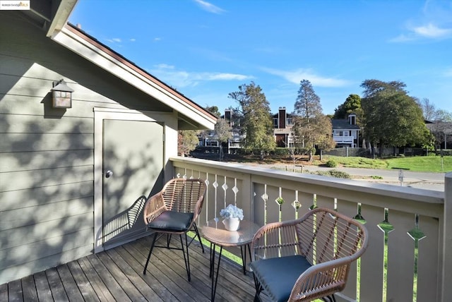 wooden balcony featuring a wooden deck