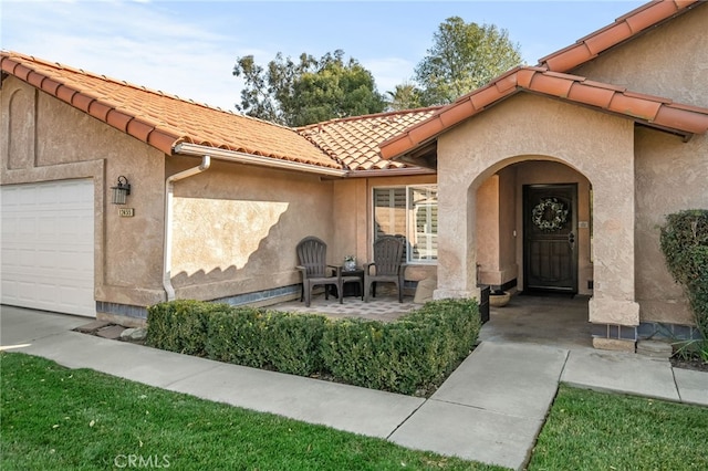 property entrance with a garage