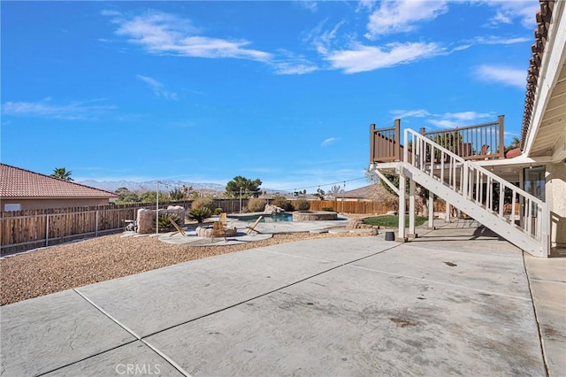 view of patio / terrace featuring a mountain view