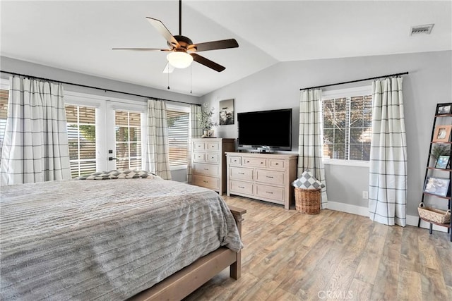 bedroom featuring lofted ceiling, ceiling fan, light hardwood / wood-style flooring, and access to exterior