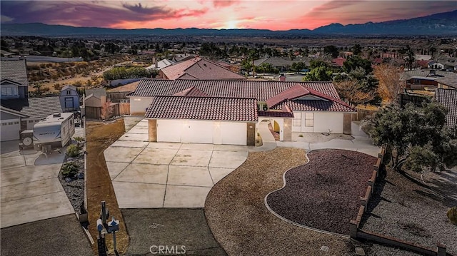 aerial view at dusk with a mountain view