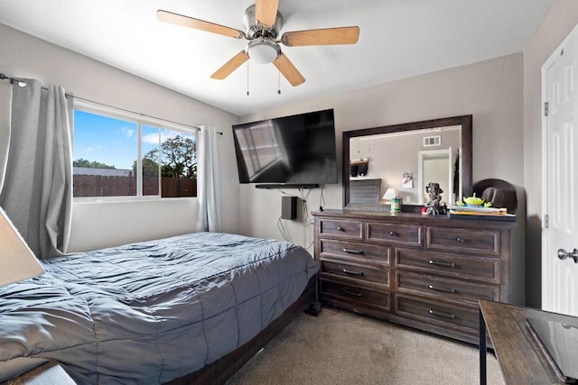 carpeted bedroom featuring ceiling fan