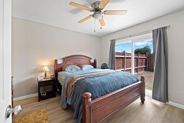 bedroom featuring ceiling fan and light wood-type flooring