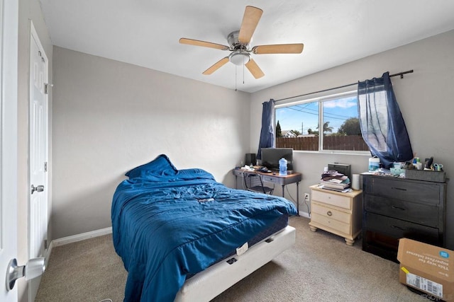 bedroom featuring ceiling fan and carpet flooring