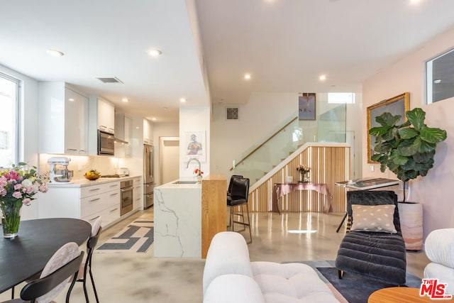 living room with sink