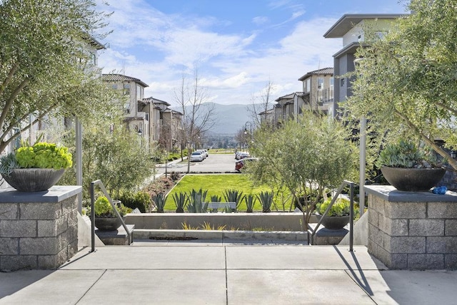 view of community with a mountain view