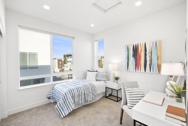 bedroom featuring light colored carpet