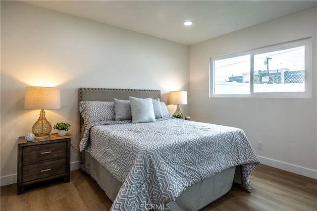 bedroom featuring wood-type flooring