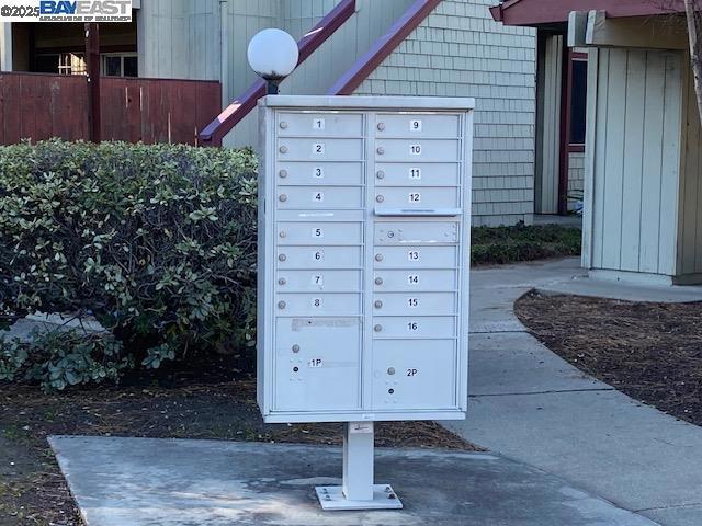 view of home's community featuring a mail area