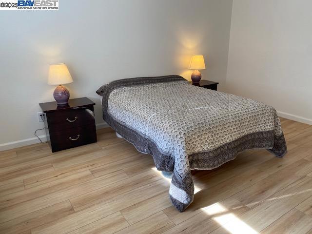 bedroom featuring light hardwood / wood-style flooring