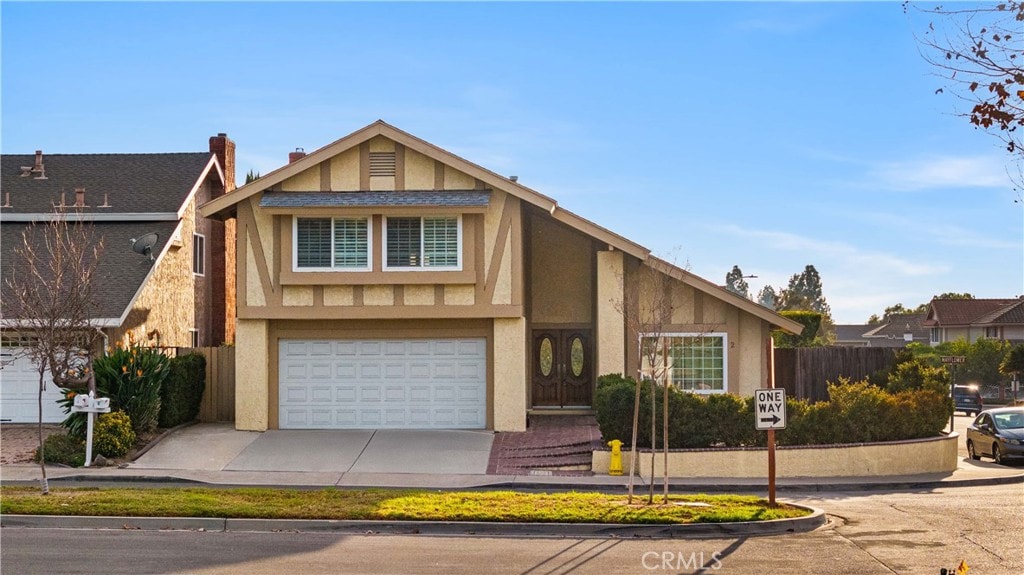 tudor house with a garage