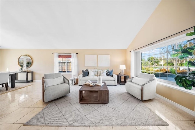 living room featuring lofted ceiling