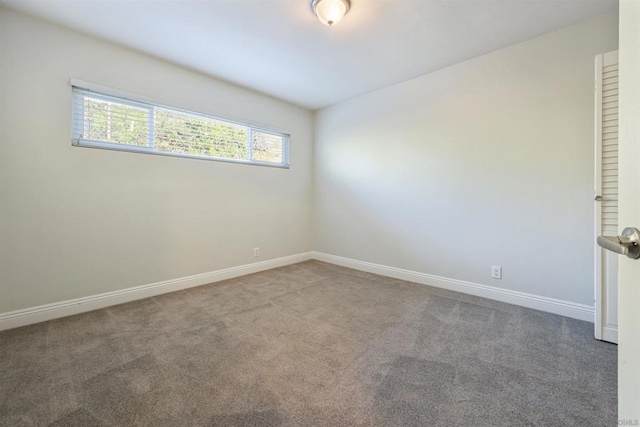 empty room with carpet floors