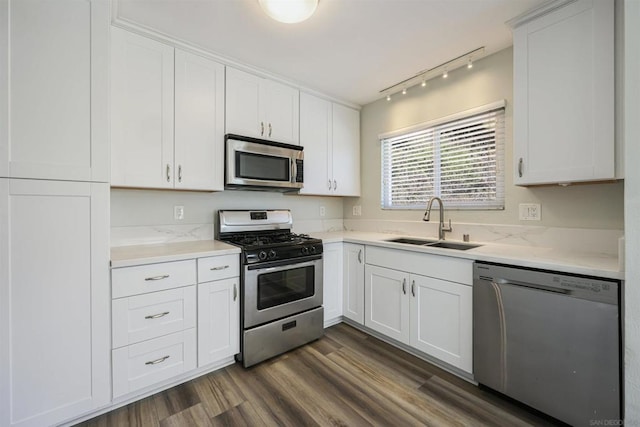 kitchen featuring appliances with stainless steel finishes and white cabinetry