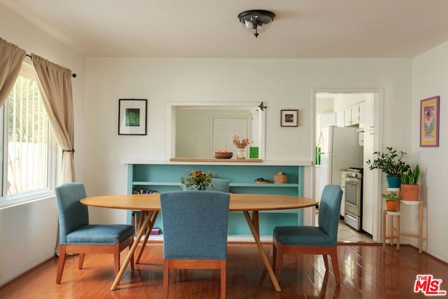 dining room featuring wood-type flooring