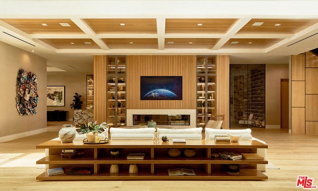 interior space with wood ceiling, light hardwood / wood-style flooring, coffered ceiling, and beam ceiling