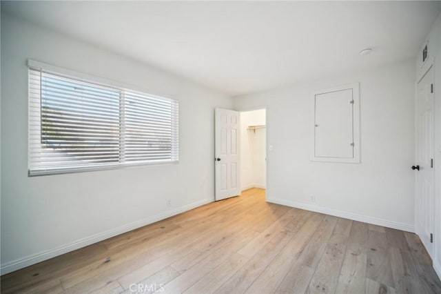 empty room featuring light hardwood / wood-style floors