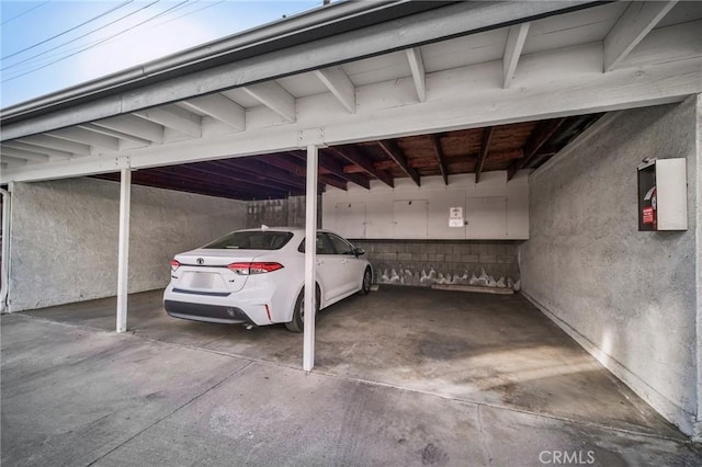 view of parking featuring a carport