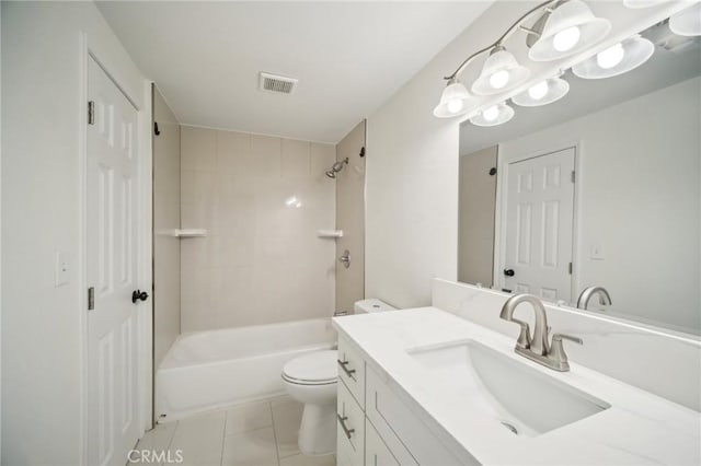 full bathroom featuring toilet, tiled shower / bath combo, tile patterned floors, and vanity